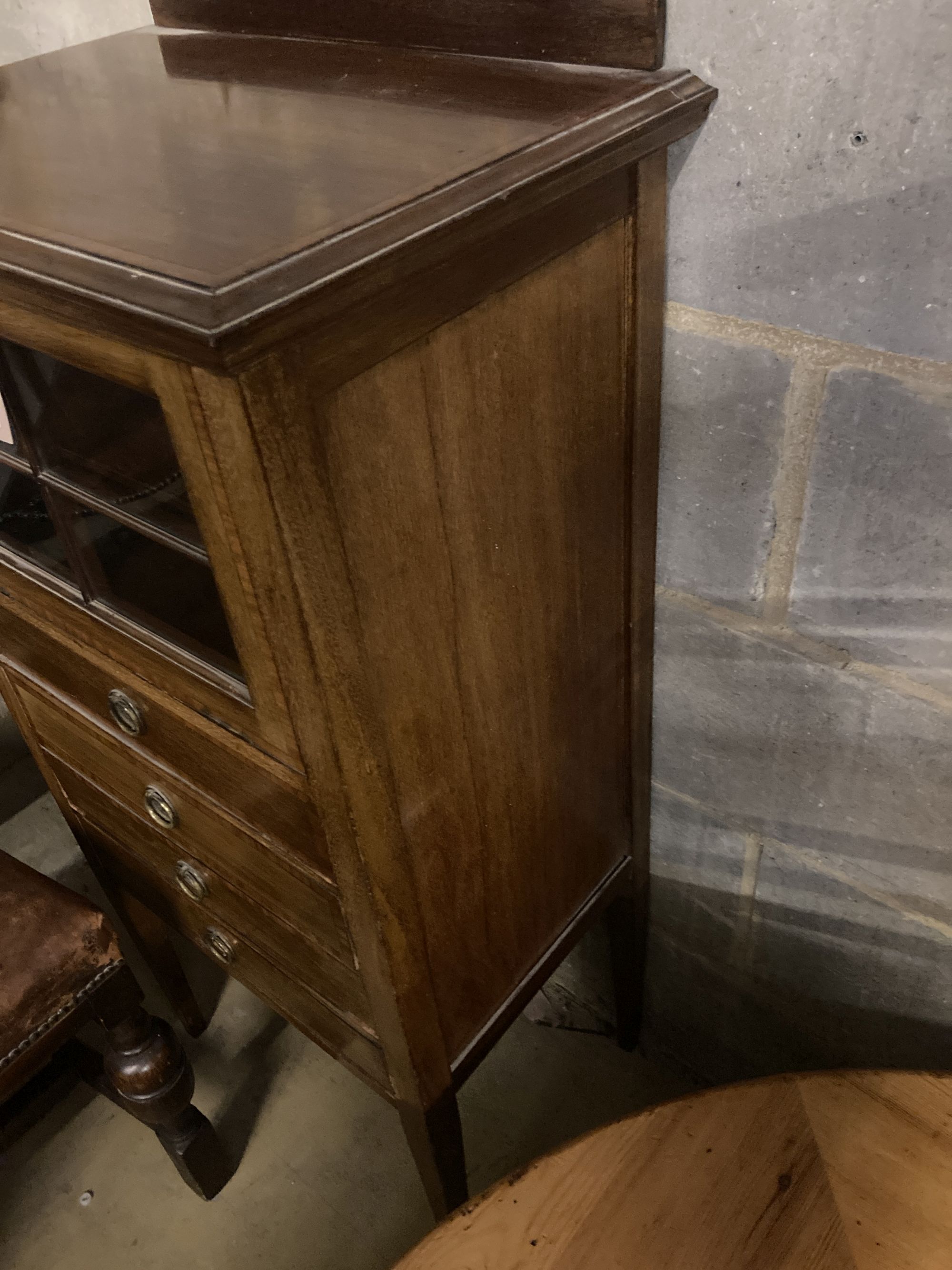 An Edwardian satinwood banded mahogany music cabinet, width 53cm depth 37cm height 108cm